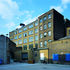 Wind cowls poke their noses above the rooftops of Shoreditch