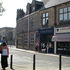 The building has a narrow frontage to the pavement on Bridge Street