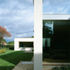 View of white rendered additions