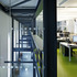 The void against the canal wall is overlooked by the ground floor mezzanine office level