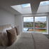View from bedroom with green roof