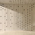 The perforated aluminium in the gateway