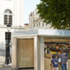 Kiosk in use, showing contrast brass mesh