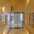 Lightwell enclosed with structural glass roof