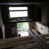 The storage loft was lowered and cut back to create the mezzanine space