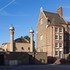 Peckham Mosque - New ploychrom brick minarets and extension and neighbouring Victorian Board School
