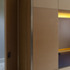 Settle; integrated door to hallway