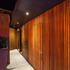 The cladding wraps the corridor to the facilities