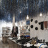 Inside the store the raffia ceiling and broom handle table legs grow like stalactite and stalagmites