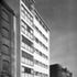 The administrative building for Messrs. W. & A. Gilbey Limited, erected on a corner site between cobbled streets serving an adjacent railway goods yard carrying heavy traffic