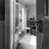 View into the smaller bedroom from the staircase landing