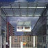 Glazed porte cochere frames the entance to the internal courtyard