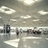Passengers on the brightly lit main concourse