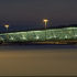 The building lit up at night