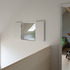 Master bedroom overlooking double height hall