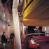 The auditorium is treated as an object placed within the envelope of the existing building
