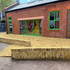RX186LC865GNC1U_6.Links_Studios._credit_Dan_Jones._Courtyard_view_showing_brick_seati