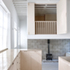 Bedroom balcony overlooking the living space and kitchen