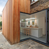 Corner opening glazing
