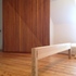 Image to show application of graphic three X motif to loose furniture against sectional half X to loft pivot door.