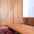 Image Showing Snug with Table in Foreground and Dividing Panels to Rear with 45º Slant in Reference to Flattened Pyramid