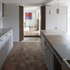 Axial route with flanking arrangement from music room to dining room as spatial reference to original perimeter wall, whilst strategically dividing preparation and cooking areas from recreational space.