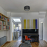 Living Room: Now a bright, spacious and dual aspect room flows through to the kitchen