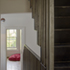 First Floor Landing: A bespoke mild steel stair provides access to the new loft bedroom.  Smoked oak flooring flows through the whole house, linking old and new
