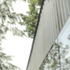 Corrugated secondary facade & curtain glazing detail