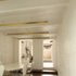 Bruton Narrow House - Dining room with new brass lights and brick vaults looking towards snug