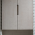 Bruton Narrow House - Birch plywood coat cupboard in brickwork niche