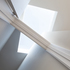 Skylight split between spaces
