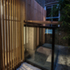 External view of sunken bath, night time