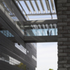 A glazed bridge connects the departments of mathematics and photon sciences