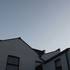 Blue sky, grey box