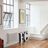 View with the new stairs to the roof with refurbished original parquet