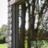 Siberian larch cladding detail to window surround