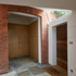 Triangular pitched roof over the side door