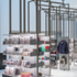 V&A Exhibition Shop view of frames with shelves, hang rails and storage bunkers.