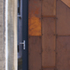corten detail, aluminum door