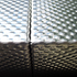 Material sample close-up showing folds and joint