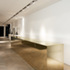 Gold cash desk, requested by chief womenswear designer Riccardo Tisci