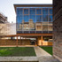 A Large glazed facade makes the studio space transparent and allows for daylighting