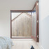 11_Common Ground Workshop_Architects_Llyod Eist House_Cottage Green_Building Narratives_master bedroom and pocket terrace