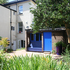 Iain_James_Jamieson-8L305AHMNNVGSQV8L305AHMNNVGSQV_IainJamieson_PottingShed_8-ThroughPlants