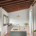 R5IFZRAELJ22P9J_AndreaRuffilliArchitectsArchitectArchitectureInteriorKitchenBespokeFurnituresTilesWindowConcreteCurtainIslandStainlessSteelCeadesignInductionSiemensFoscariniPendantLightAplombPaintDesignBarcelonaSpainTimberStructure_08