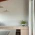 R5IFZRAELJ22P9J_AndreaRuffilliArchitectsArchitectArchitectureInteriorKitchenBespokeFurnituresTilesWindowConcreteCurtainIslandStainlessSteelCeadesignInductionSiemensFoscariniPendantLightAplombPaintDesignBarcelonaSpainTimberStructure_09