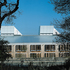 The light scoops and chimneys and the louvered timber shutters are the defining features of the aesthetic of the scheme