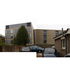 The severity of the south facade makes the surroundings picturesque by contrast