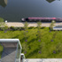 View from balcony overlooking canal and public park